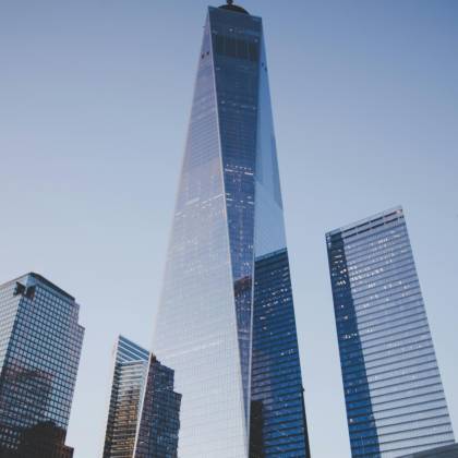 View Of The One World Trade Center And Surrounding Skyscrapers At Dusk In New York City.