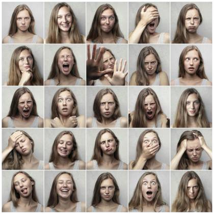 Multiple Portraits Showcasing Various Facial Expressions And Emotions Of A Young Woman.