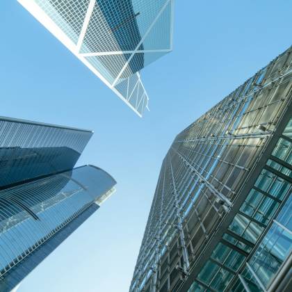 Modern Skyscrapers Captured From Below, Showcasing Hong Kong's Urban Architecture.